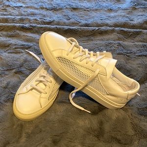 WOMAN BY COMMON PROJECTS
Achilles White Mesh Low-Top Sneaker